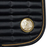 Detail logo saddle pad Denici Cavalli Gold