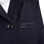 Detail borstzakje Junior rijjasje QHP Kae