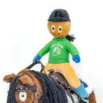 Crafty Ponies achterzijde Ponyrijdster Ruiter Jamie close up op paard